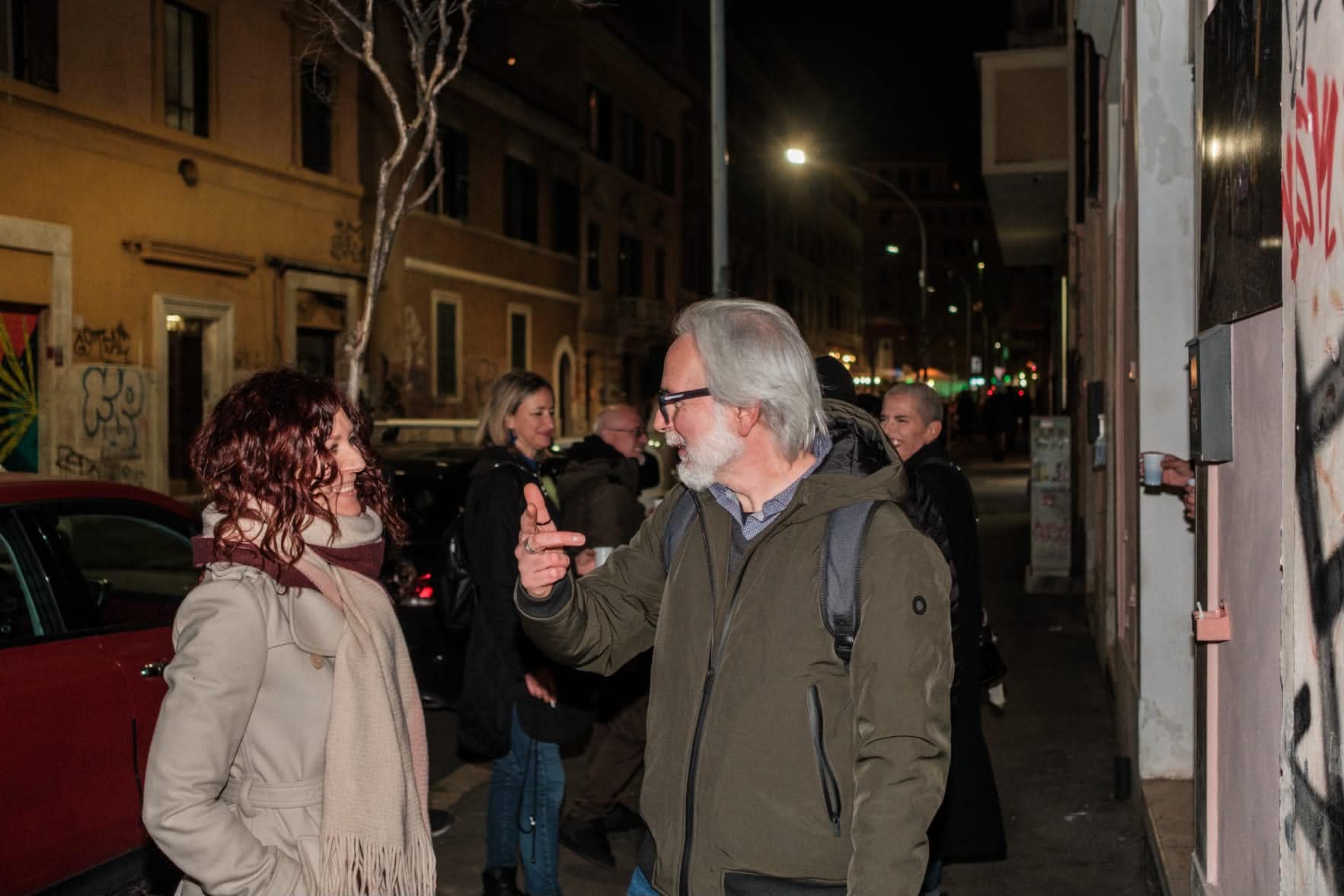 Guests speak outside Daylight School for the Mareterno presentation