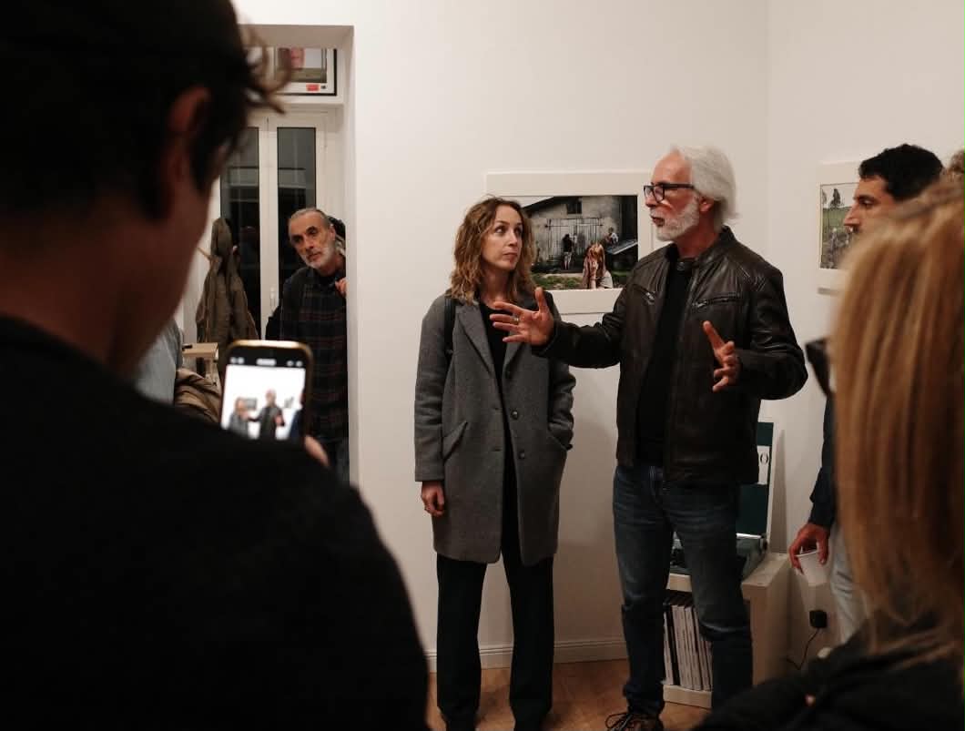 Photographers Stefano Mirabella and Valeria Tofanelli are presenting their book *DOM* to the audience at Daylight, a photography school in Rome.
