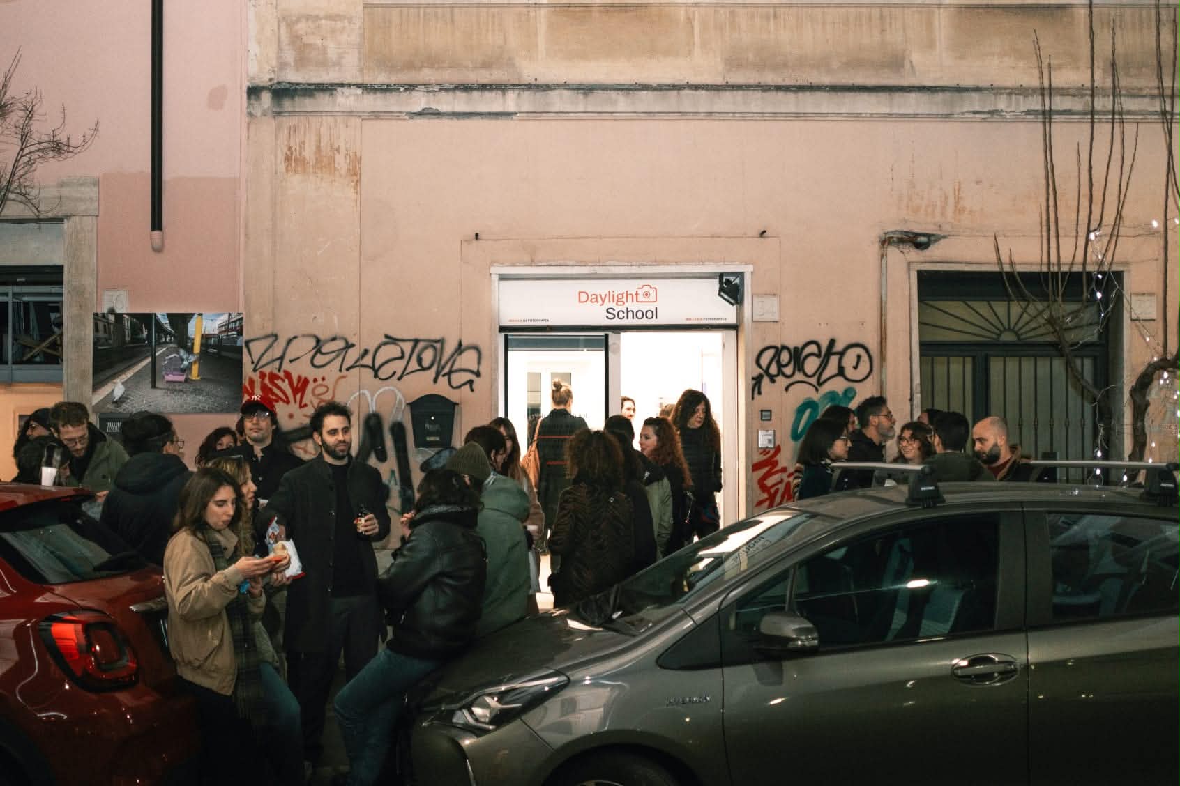 Exterior of Daylight School Pigneto with an audience for the Mareterno presentation